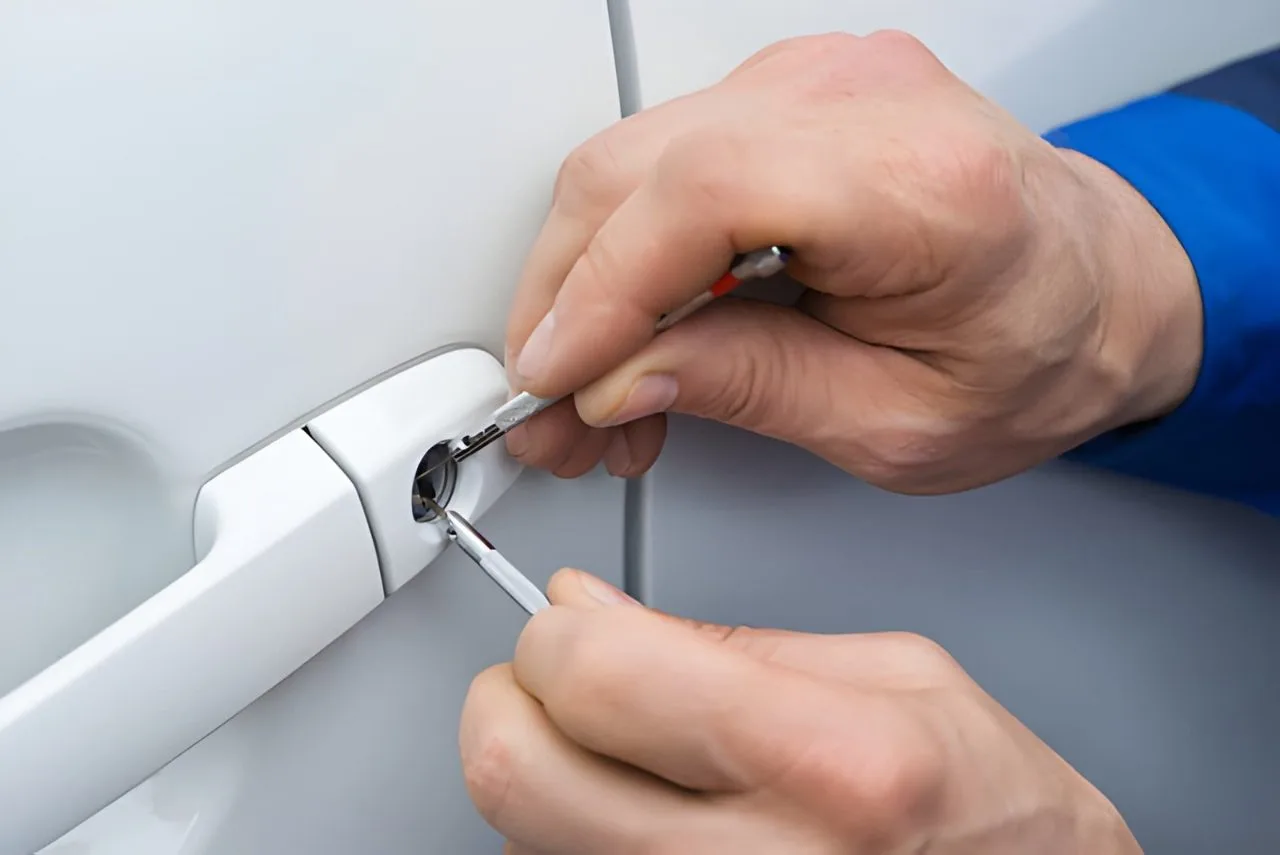 Locksmith unlocking a car door in Dubai