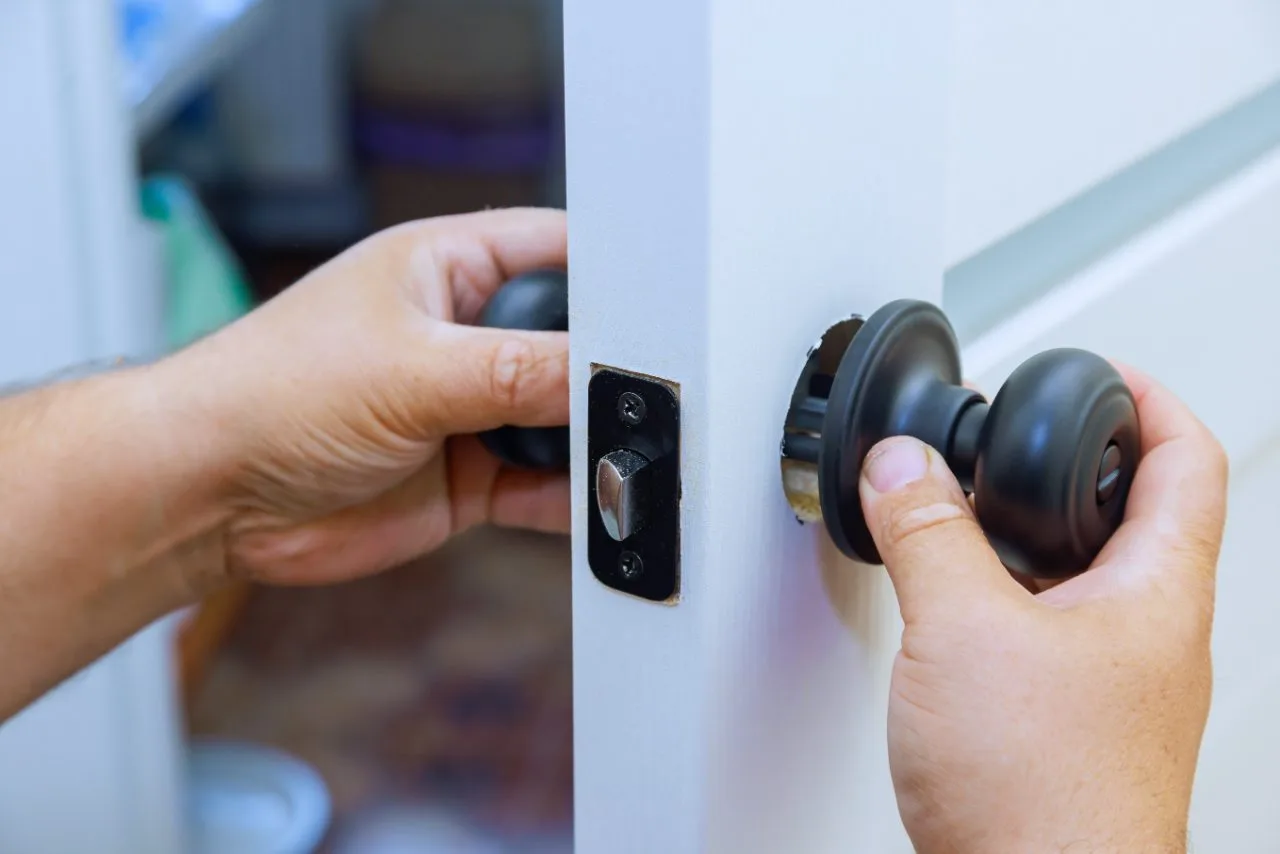 Locksmith changing a door lock in Dubai